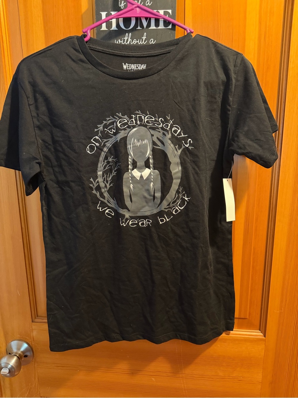 Black Graphic T‑Shirt - "On s We Wear Black"